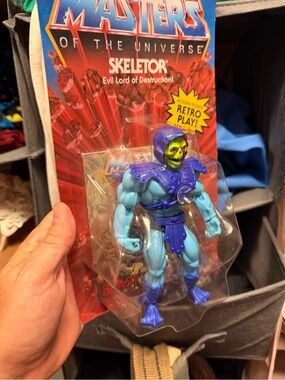Mattel Skeletor Action Figure - Blue & Purple with Yellow Skull